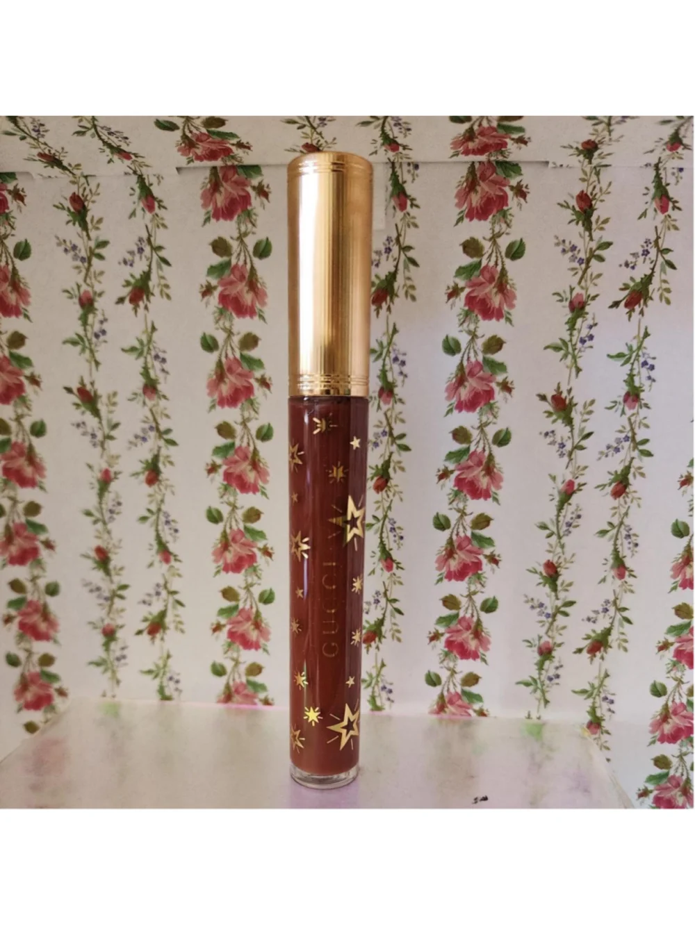 Gucci lip gloss in brown with gold stars #luxury #lipgloss